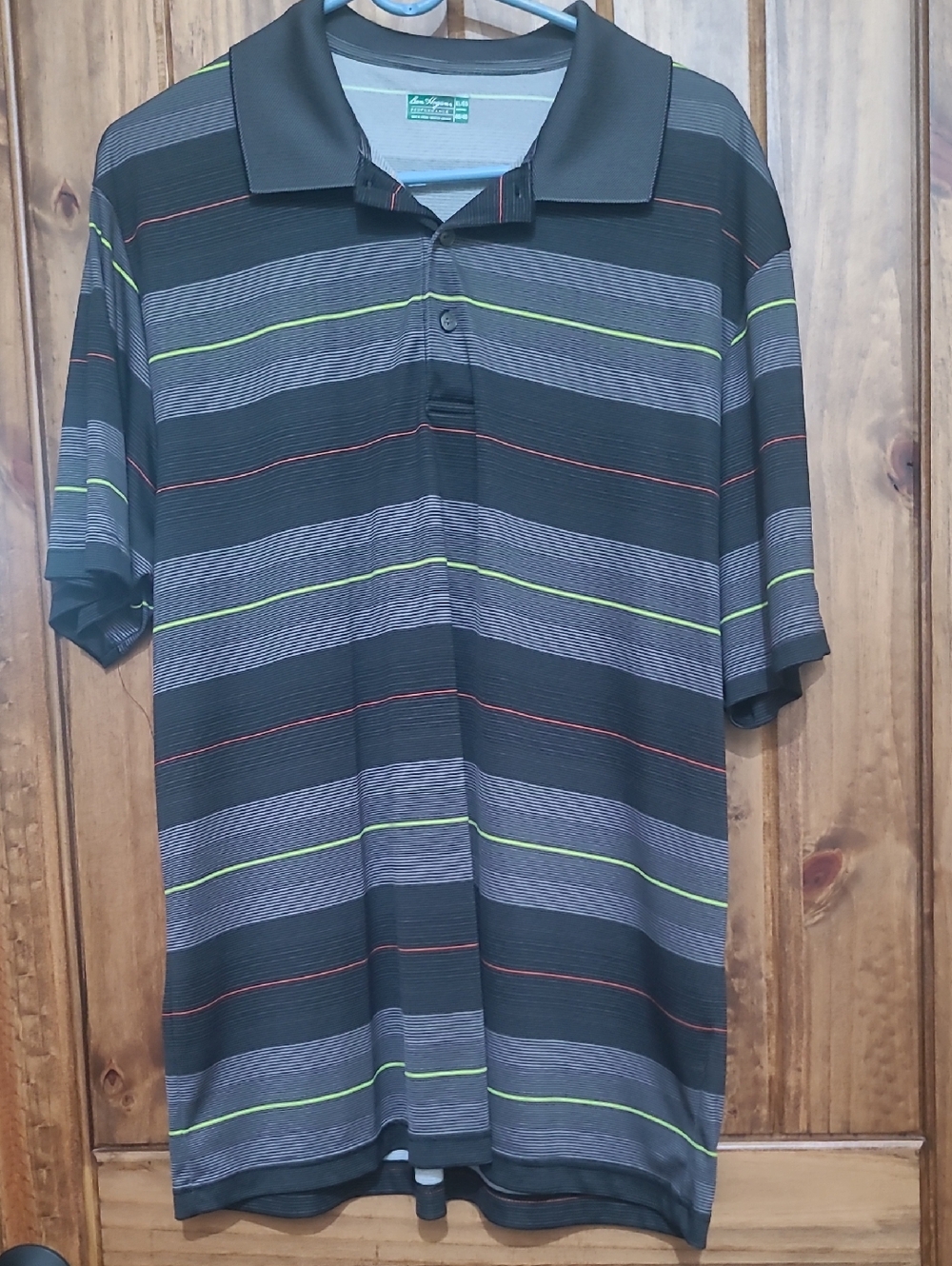 Ben Hogan Black Polo with Gray, Lime and Red Stripes. Size XL